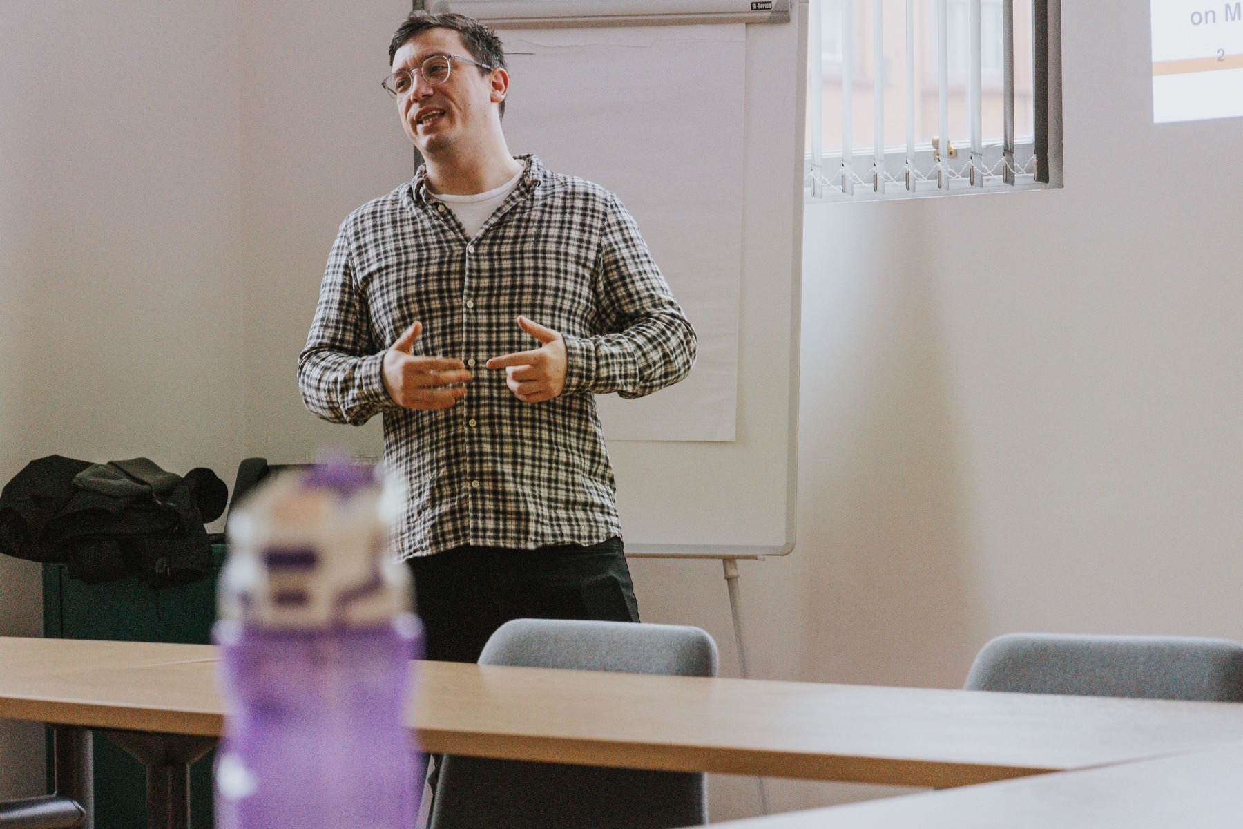 Dan McGovern speaking during an in-person business workshop.